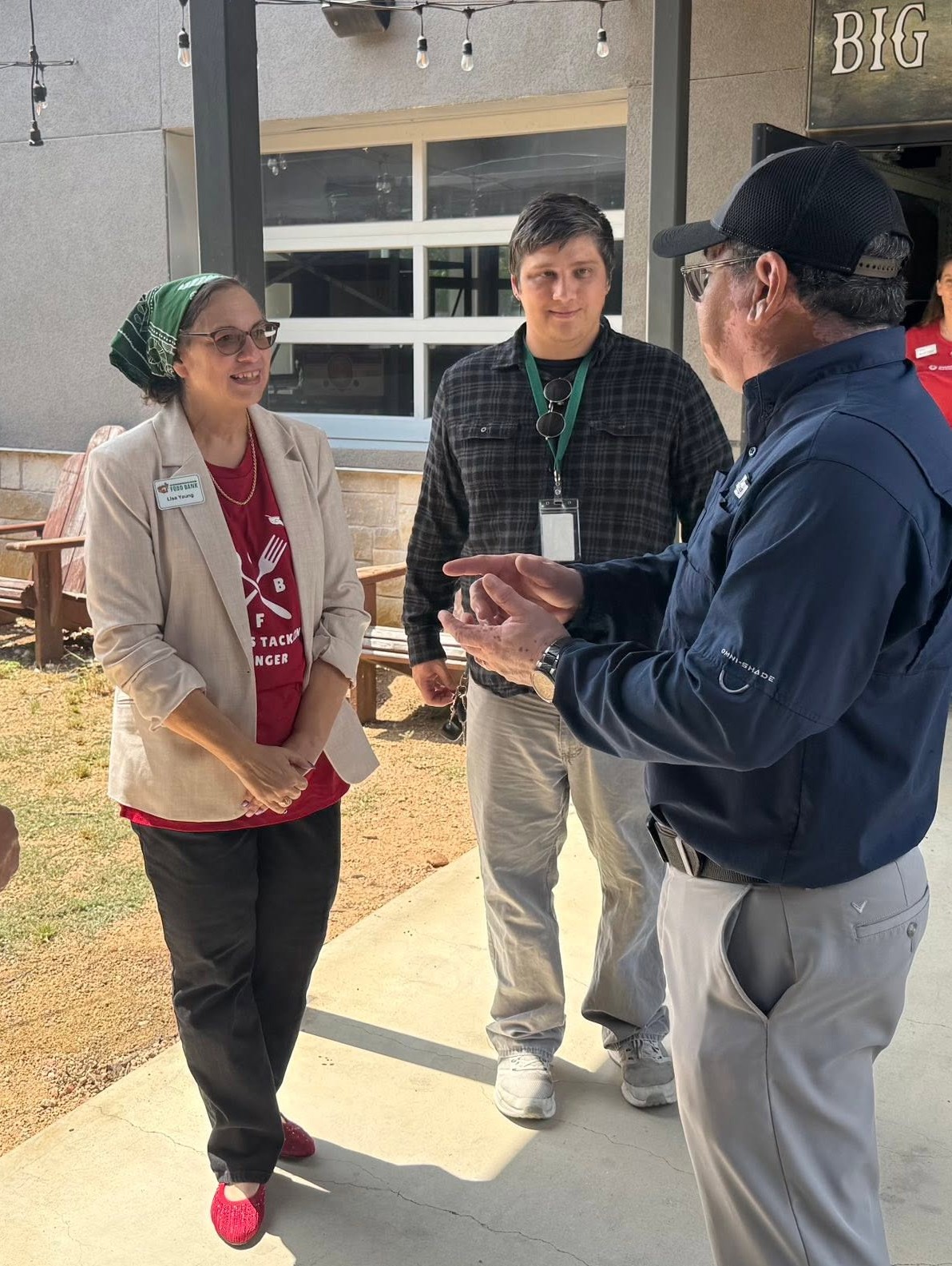 Robert Rizo speaking with members of the Hays County Food Bank